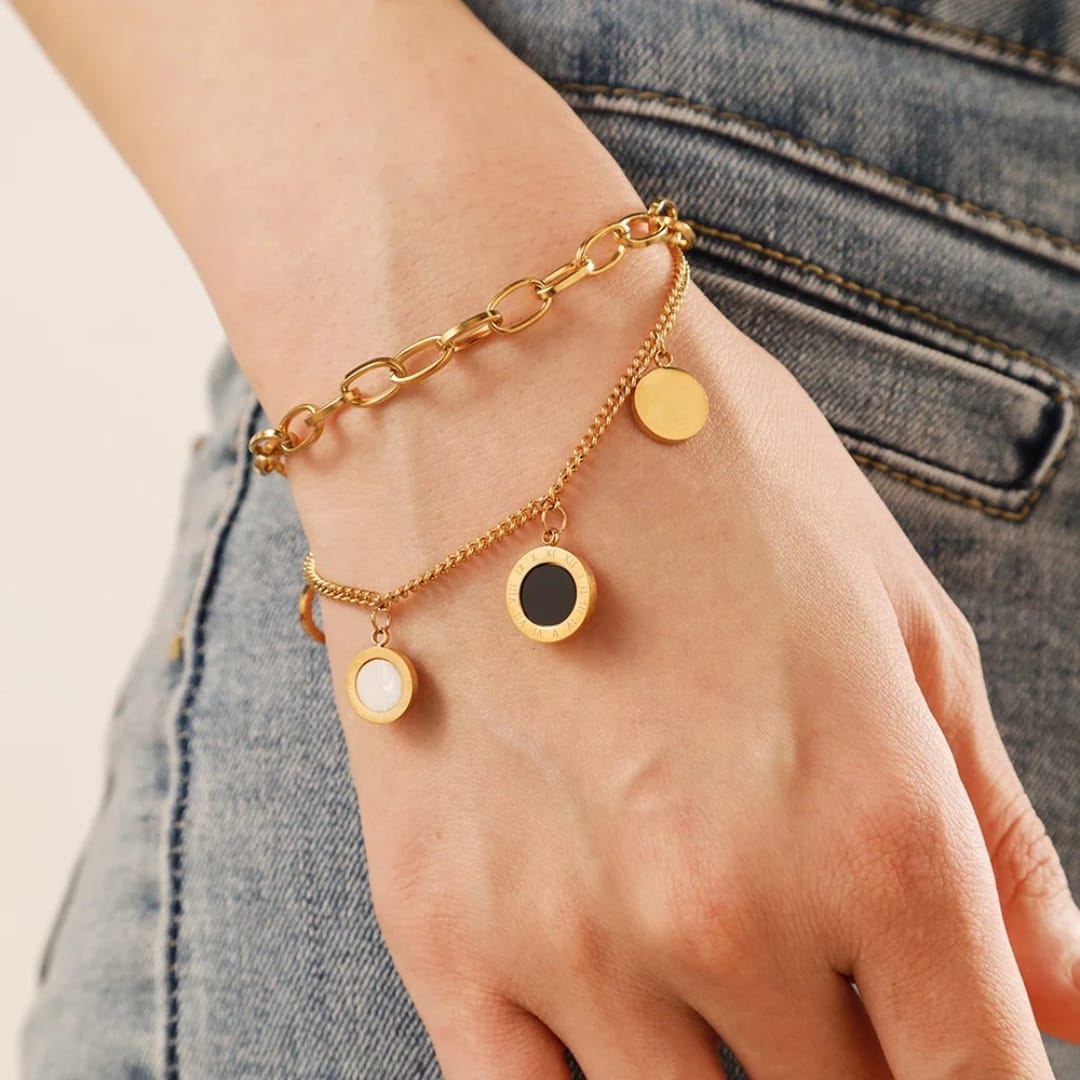 Bracciale Cerchi d’Oro con dettagli in madreperla e onice