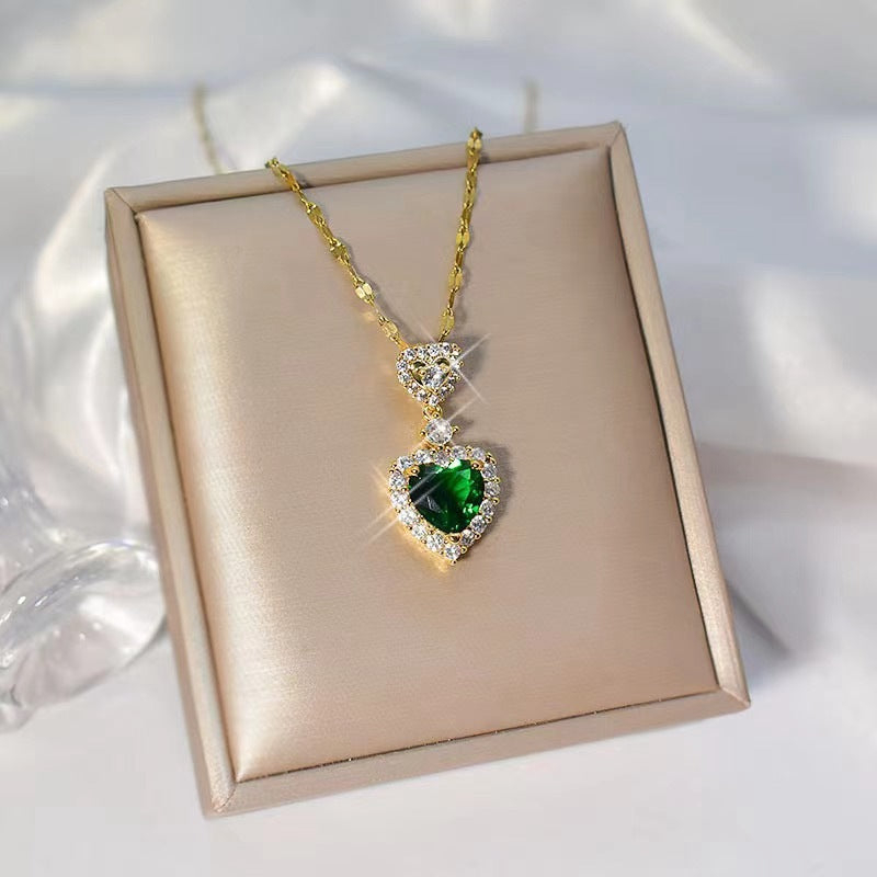 Collana con ciondolo cuore e zircone verde in acciaio inox