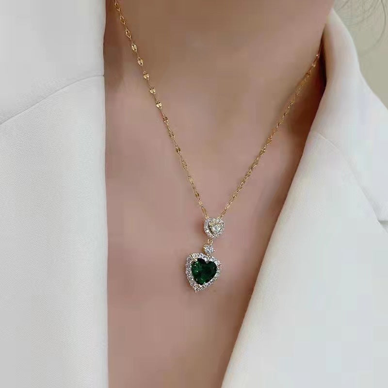 Collana con ciondolo cuore e zircone verde in acciaio inox