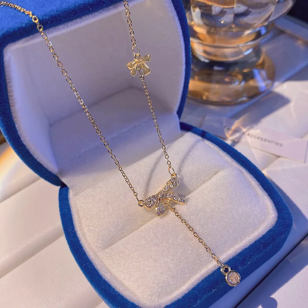 Collana con Fiocchetto e Diamante in Acciaio Inox