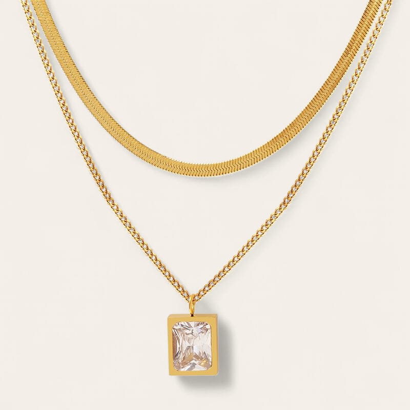Collana con ciondolo in zirconi verdi e catena in acciaio inox
