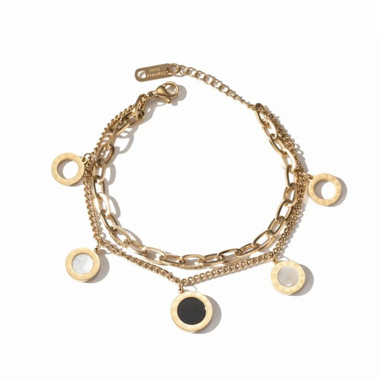Bracciale Cerchi d’Oro con dettagli in madreperla e onice