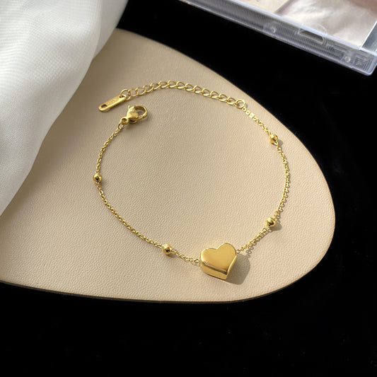 Bracciale perline con cuore in acciaio inox