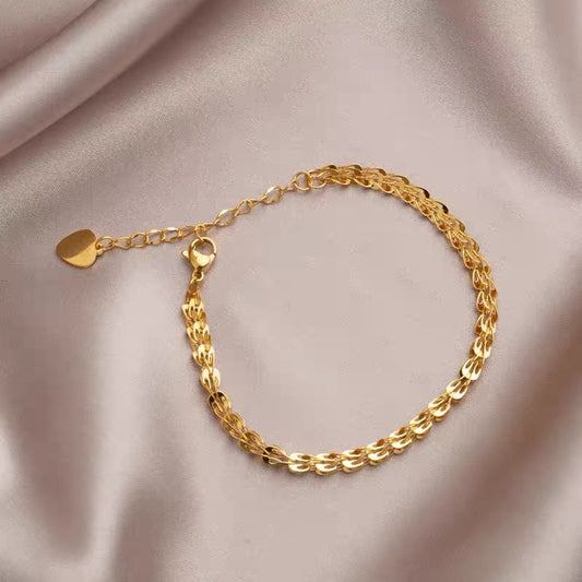 Bracciale dorato intreccio elegante in acciaio inox