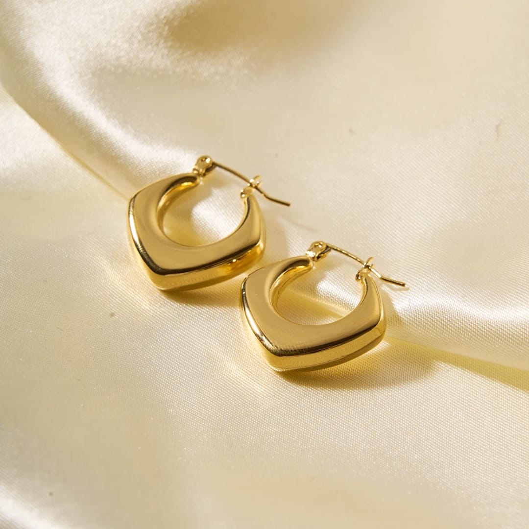 Orecchini cerchio geometrico dorato in acciaio inox